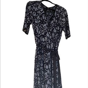 Formal black and gray midi dress with sleeves and pockets